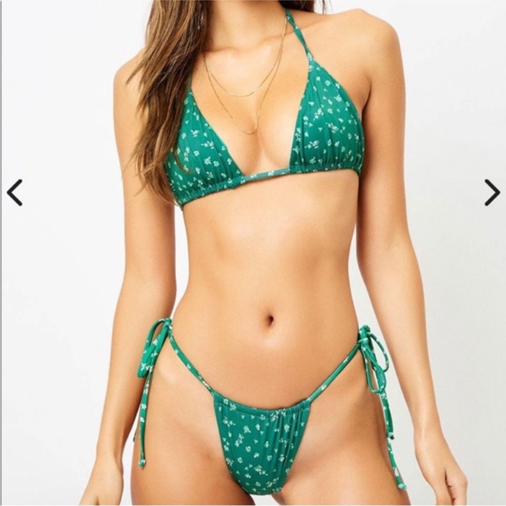 Frankie’s Bikinis Green Ditsy Floral Tia Bikini Set includes both top and bottom